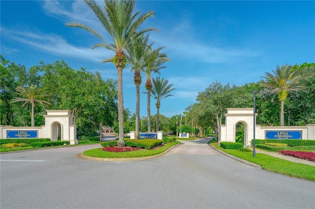 276 Gala Cir, Daytona Beach, FL 32124 - view of asphalt road with curbs and street lighting