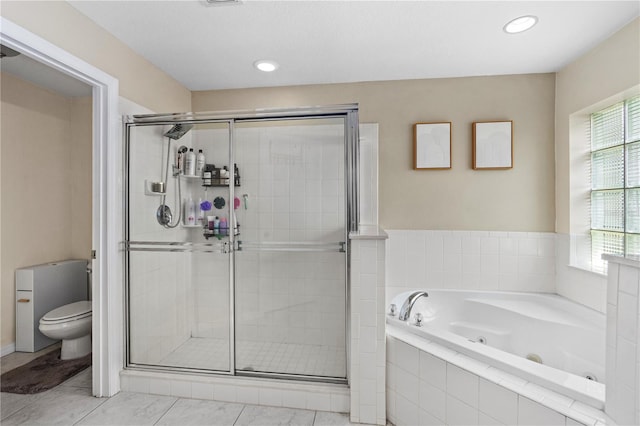 full bathroom with a whirlpool tub, toilet, recessed lighting, and a stall shower