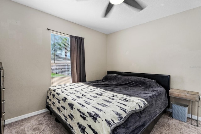 bedroom featuring baseboards, carpet, and a ceiling fan