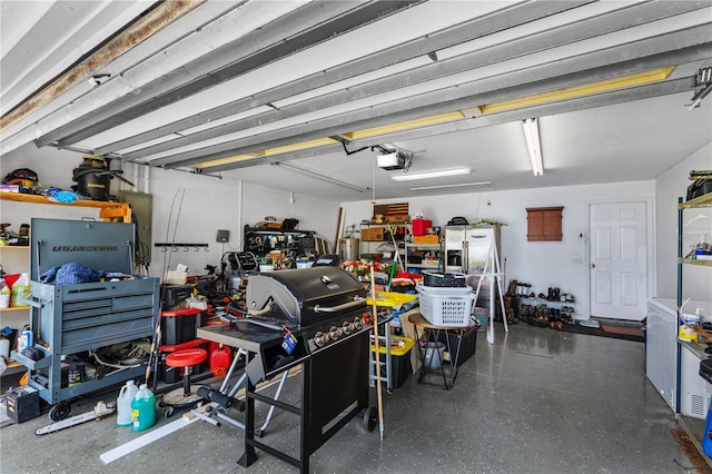 garage featuring a garage door opener
