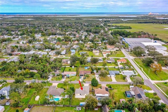 aerial view with a water view and a residential view