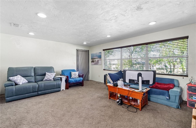 office area featuring carpet flooring, recessed lighting, and a textured ceiling