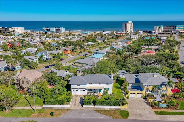aerial view featuring a residential view and a water view