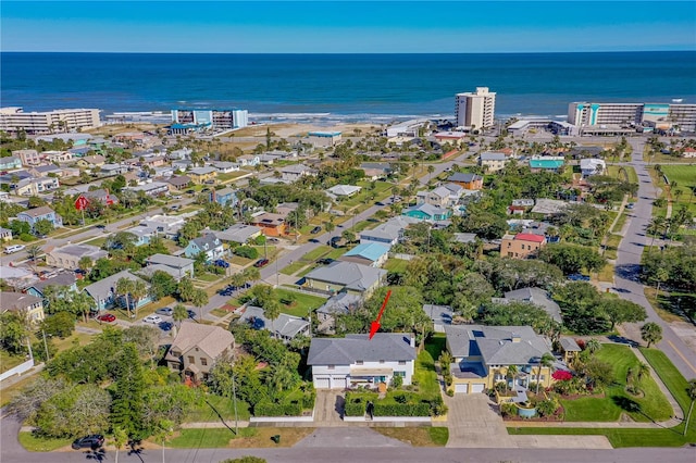 aerial view with a water view and a residential view