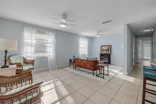 128 Oakridge Ave, Edgewater, FL 32132 - dining space with light tile patterned flooring, a ceiling fan, visible vents, and baseboards