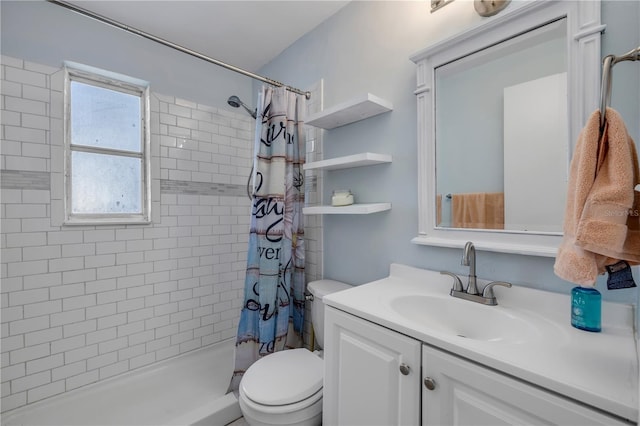 128 Oakridge Ave, Edgewater, FL 32132 - full bathroom featuring vanity, toilet, and a stall shower