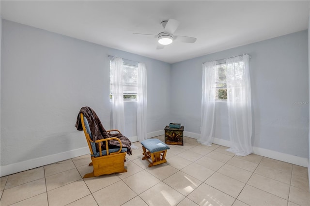 128 Oakridge Ave, Edgewater, FL 32132 - sitting room featuring baseboards, plenty of natural light, and ceiling fan