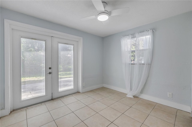 128 Oakridge Ave, Edgewater, FL 32132 - unfurnished room with baseboards, ceiling fan, plenty of natural light, and french doors