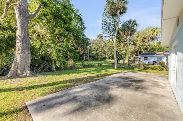 128 Oakridge Ave, Edgewater, FL 32132 - view of yard with a patio area