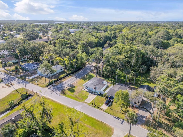 128 Oakridge Ave, Edgewater, FL 32132 - drone / aerial view featuring a view of trees
