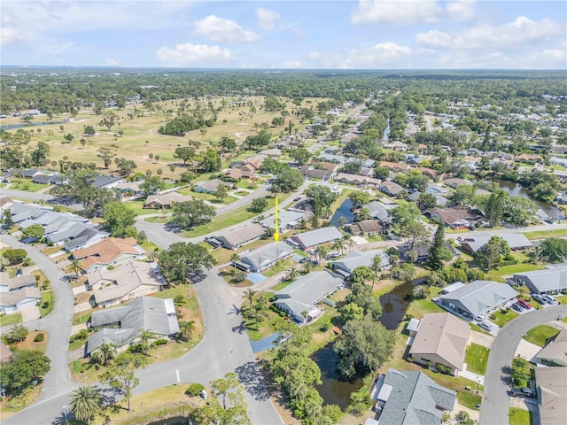 birds eye view of property with a residential view