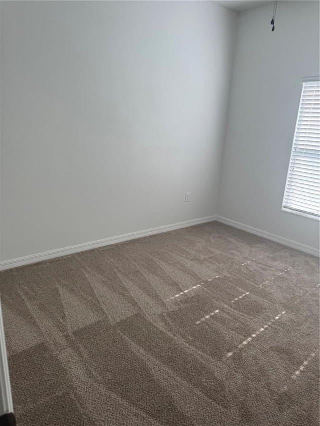926 Clover St, Deland, FL 32720 - carpeted empty room featuring baseboards