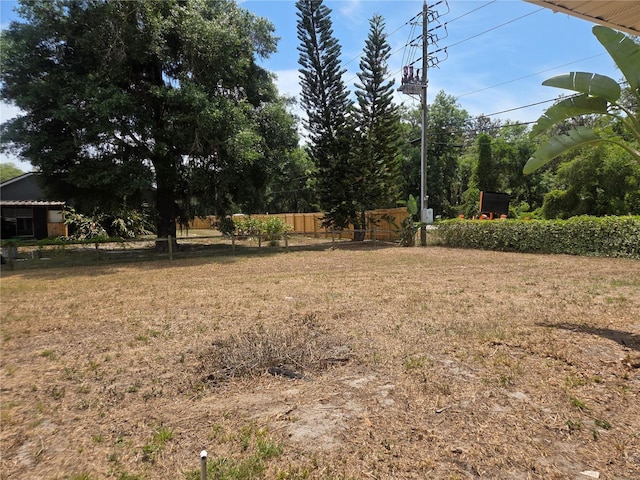view of yard featuring fence