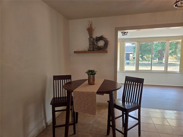 view of tiled dining space