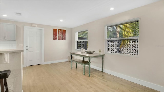 88 Valencia Dr, Ormond Beach, FL 32176 - home office with light wood-type flooring, baseboards, and recessed lighting