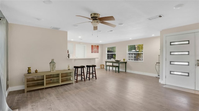 88 Valencia Dr, Ormond Beach, FL 32176 - entryway with light wood finished floors, ceiling fan, baseboards, and recessed lighting