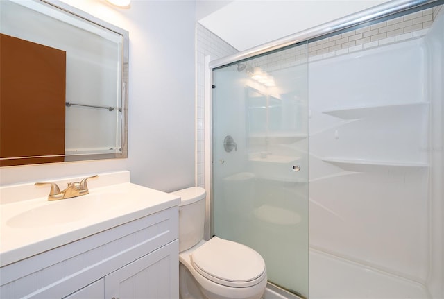 3107 Mapleshade St, Deltona, FL 32738 - bathroom featuring toilet, a shower stall, and vanity
