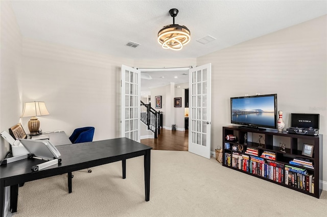 163 Rosa Bella Vw, Debary, FL 32713 - carpeted office with french doors, baseboards, and visible vents