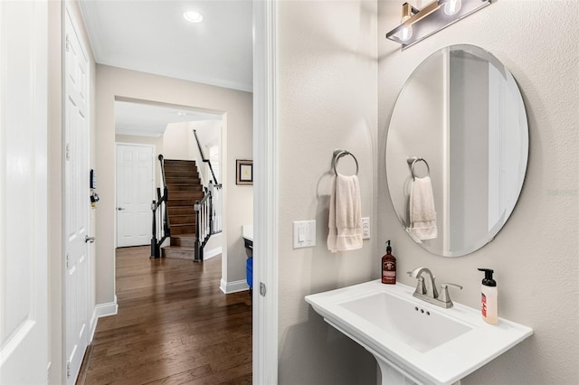 163 Rosa Bella Vw, Debary, FL 32713 - bathroom featuring a sink, baseboards, recessed lighting, and wood finished floors