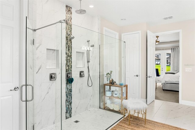 163 Rosa Bella Vw, Debary, FL 32713 - full bath featuring visible vents, marble finish floor, ensuite bathroom, baseboards, and a marble finish shower