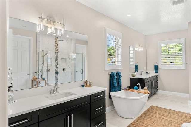 163 Rosa Bella Vw, Debary, FL 32713 - bathroom with visible vents, a sink, baseboards, marble finish floor, and a marble finish shower