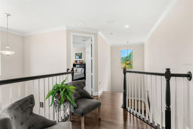 163 Rosa Bella Vw, Debary, FL 32713 - hall featuring crown molding, baseboards, wood-type flooring, and an upstairs landing