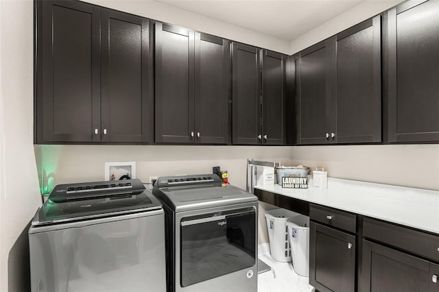 163 Rosa Bella Vw, Debary, FL 32713 - laundry room with cabinet space and washing machine and clothes dryer