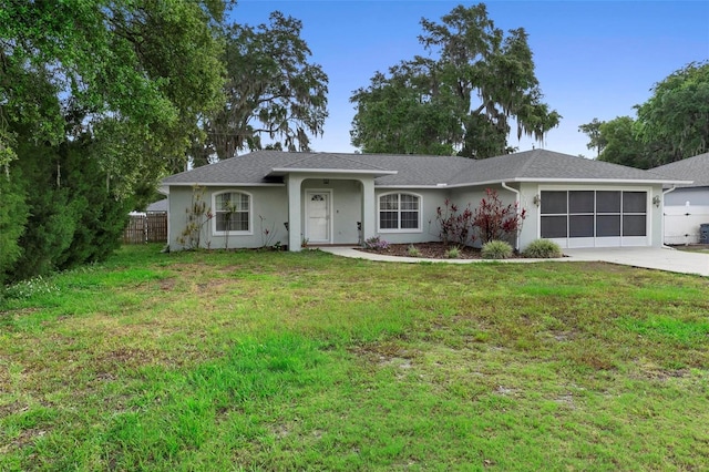 1715 Queen Palm Dr, Edgewater, FL 32132 - ranch-style home with an attached garage, driveway, and stucco siding