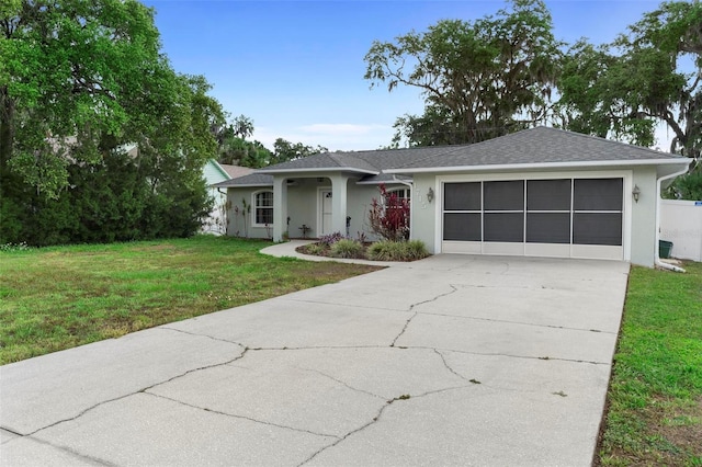 1715 Queen Palm Dr, Edgewater, FL 32132 - single story home with stucco siding, a garage, driveway, and a front yard