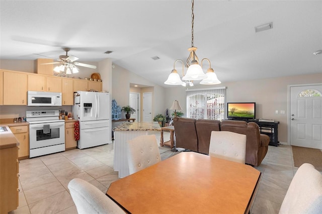 1715 Queen Palm Dr, Edgewater, FL 32132 - dining area featuring light tile patterned floors, lofted ceiling, a chandelier, and a ceiling fan