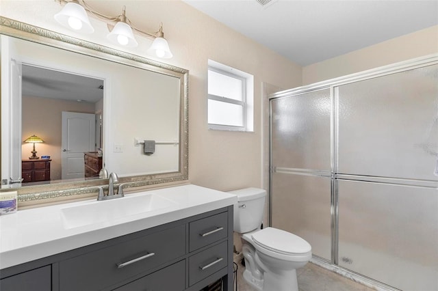 1715 Queen Palm Dr, Edgewater, FL 32132 - bathroom with a stall shower, toilet, and vanity