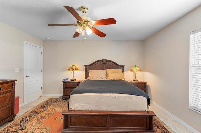 1715 Queen Palm Dr, Edgewater, FL 32132 - bedroom with ceiling fan and baseboards