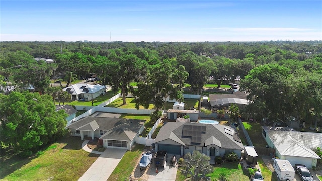 1715 Queen Palm Dr, Edgewater, FL 32132 - aerial view of residential area featuring a heavily wooded area