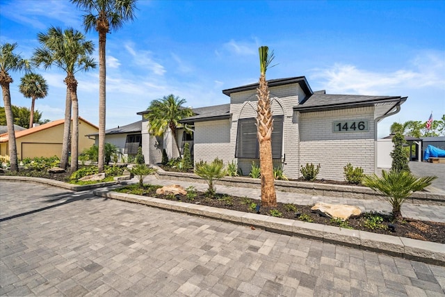 1446 Stone Trl, Enterprise, FL 32725 - view of front of house featuring brick siding