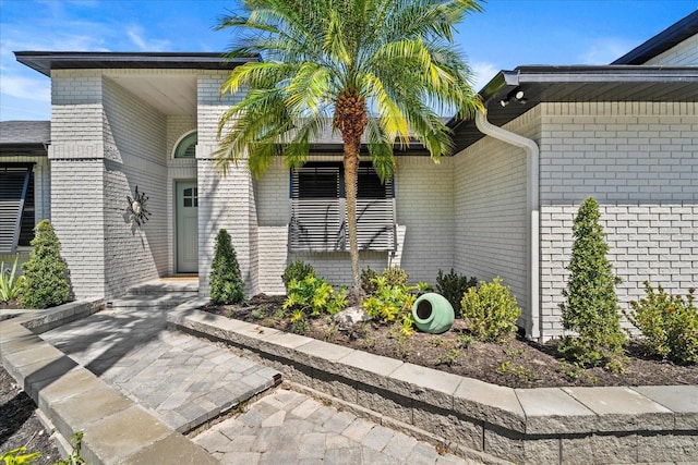 1446 Stone Trl, Enterprise, FL 32725 - view of exterior entry with brick siding