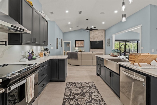 1446 Stone Trl, Enterprise, FL 32725 - kitchen with a ceiling fan, a sink, wall chimney exhaust hood, visible vents, and appliances with stainless steel finishes