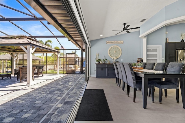 1446 Stone Trl, Enterprise, FL 32725 - dining room with visible vents, lofted ceiling, and ceiling fan