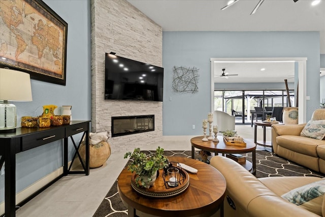 1446 Stone Trl, Enterprise, FL 32725 - tiled living room with a ceiling fan and a fireplace