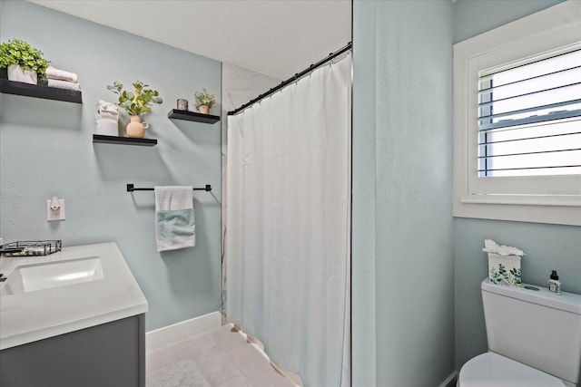 1446 Stone Trl, Enterprise, FL 32725 - bathroom with toilet, a shower with curtain, tile patterned flooring, baseboards, and vanity