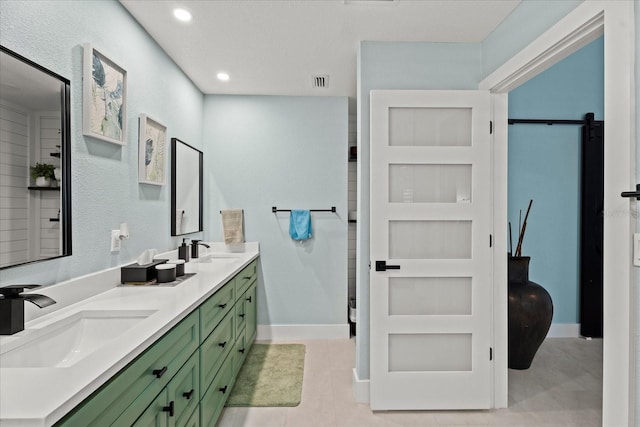 1446 Stone Trl, Enterprise, FL 32725 - full bath with a sink, double vanity, recessed lighting, and tile patterned floors