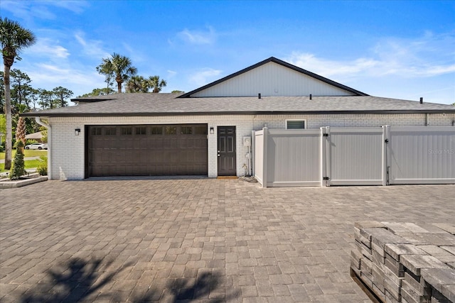 1446 Stone Trl, Enterprise, FL 32725 - garage with fence and a gate