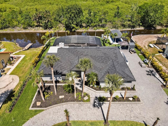 1446 Stone Trl, Enterprise, FL 32725 - bird's eye view featuring a wooded view and a water view