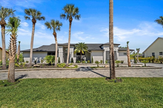1446 Stone Trl, Enterprise, FL 32725 - view of front of home featuring a front lawn