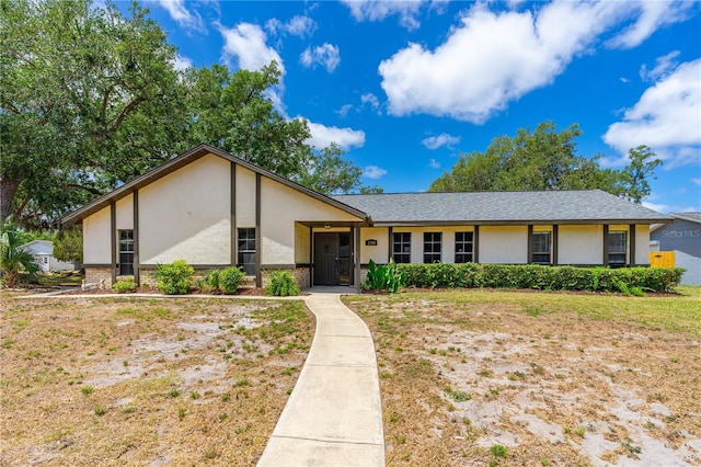 5788 Devon St, Port Orange, FL 32127 - view of front of property with stucco siding and brick siding