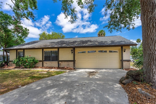 5788 Devon St, Port Orange, FL 32127 - single story home featuring brick siding, driveway, a garage, and stucco siding