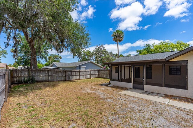 5788 Devon St, Port Orange, FL 32127 - view of yard featuring a sunroom