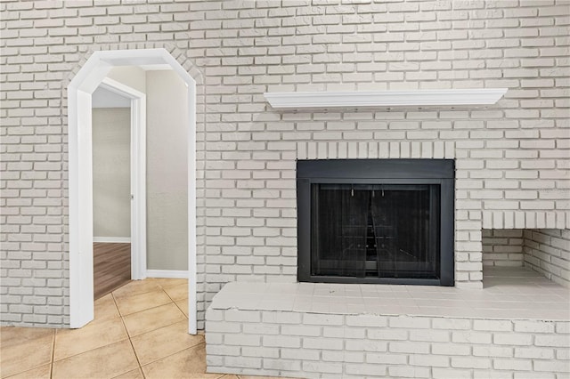 5788 Devon St, Port Orange, FL 32127 - detailed view of a brick fireplace and baseboards