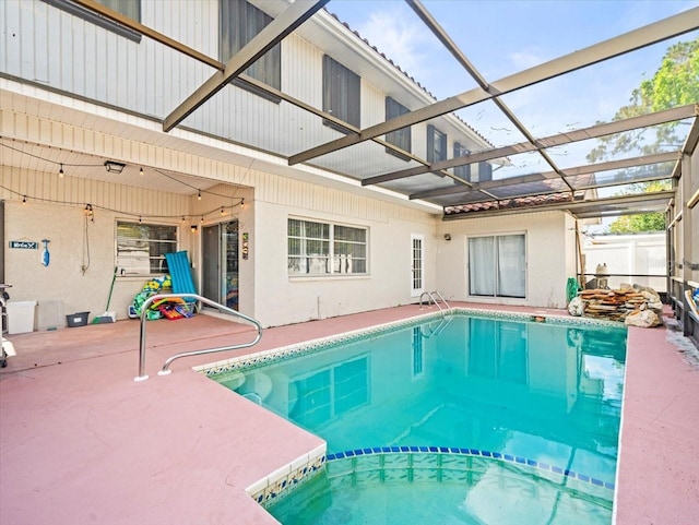 view of swimming pool featuring a patio and a pool with connected hot tub