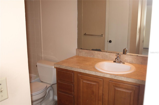bathroom with vanity and toilet