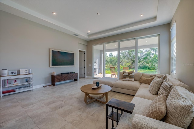 887 Lake Hill Way, Deland, FL 32724 - living area with visible vents, baseboards, a raised ceiling, and recessed lighting